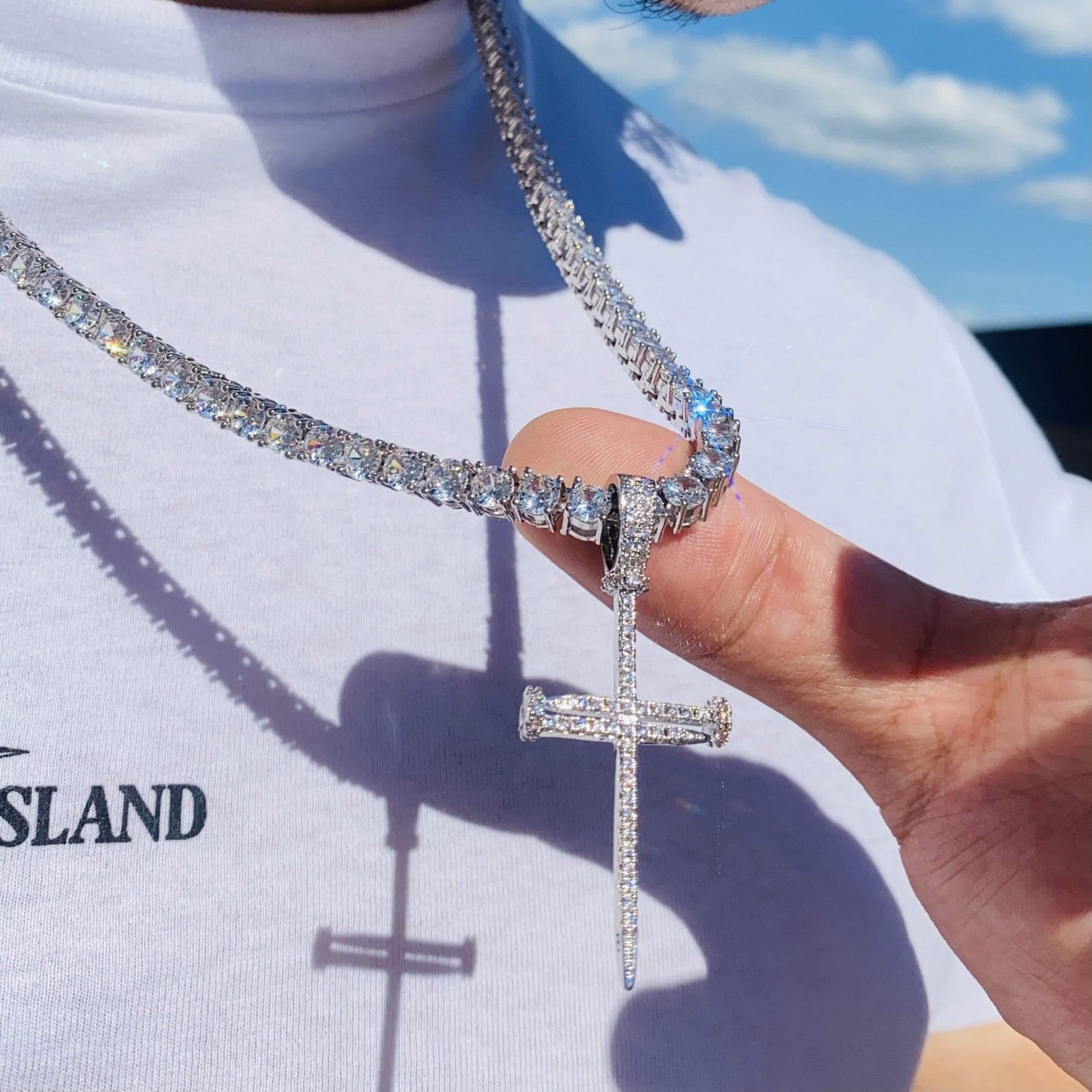 diamond-nail-cross-pendant-
