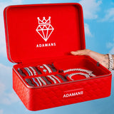 Red leather travel jewellery case by Adamans, featuring premium craftsmanship and organized interior for secure jewelry storage.