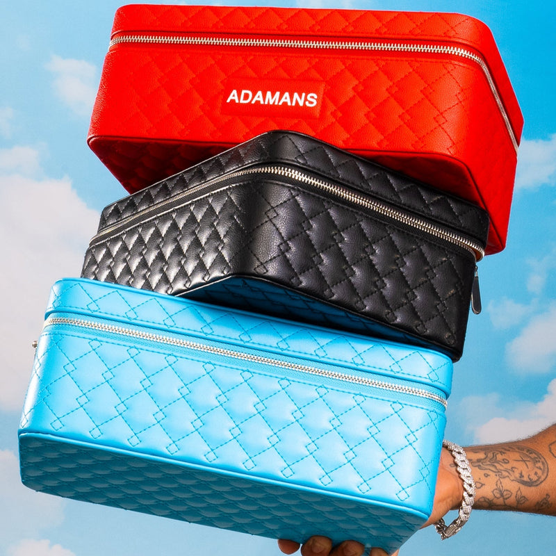 Red leather travel jewellery case by Adamans with quilted design, premium top grain leather, and stackable ultra suede trays.